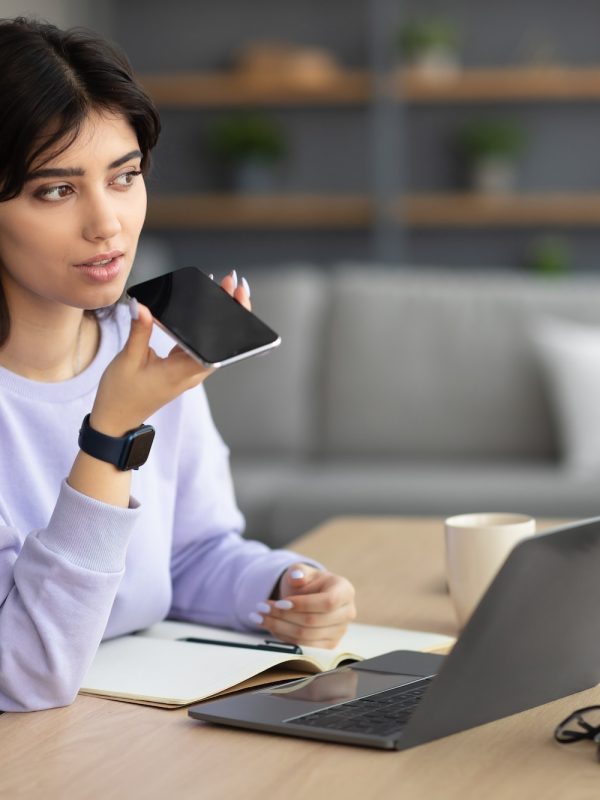 woman-using-voice-search-assistant-on-smart-phone.jpg